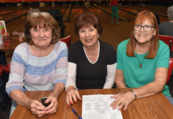 Some members and alumnae of St. Maurice Church even bowl together. From left are Paula McCoy, Carol Pfeiffer and Mary Ann Burns.