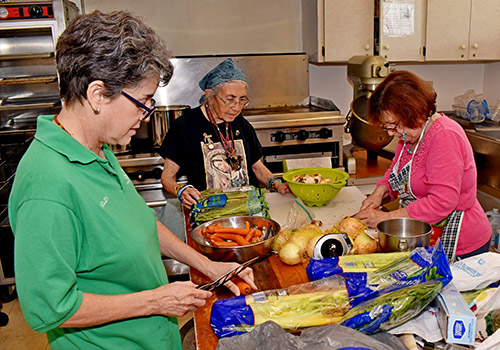 St. Maurice members prepare a meatless soup for a Lenten Friday lunch. From left are Helen Aguila, Mary Alonso and Diana DeStefano.