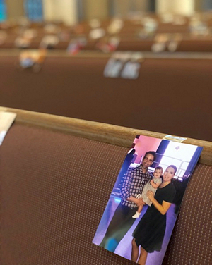 Parishioners had their photos taped to the pews at St. Mark Church, to show their support even if they couldn't attend physically.