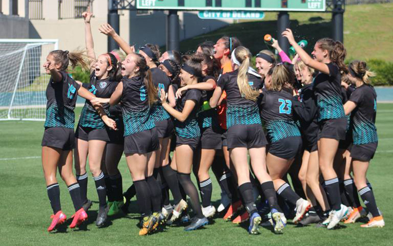 Archbishop McCarthy High School's girls varsity soccer team celebrate after winning the school's first state championship. They defeated Ponte Vedra 2-0 in the Class 5A game held Feb. 28, 2020 in DeLand. The Mavericks finished the season with a record of 22-1-2.