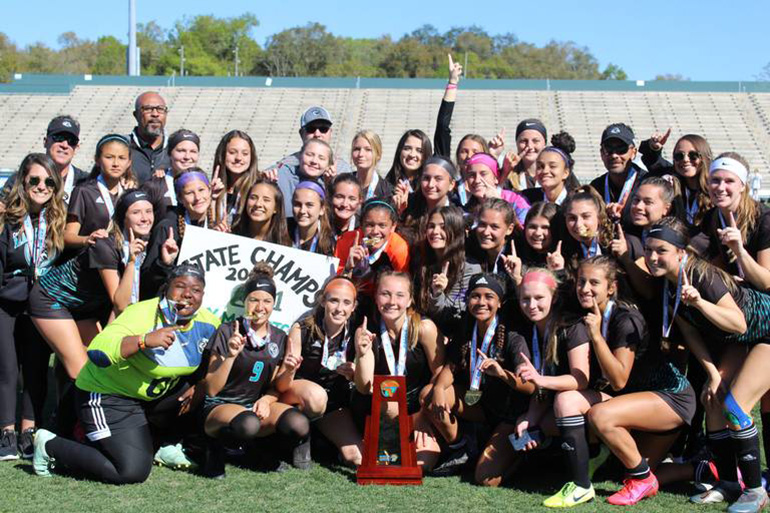 Archbishop McCarthy High School's girls varsity soccer team celebrate after winning the school's first state championship. They defeated Ponte Vedra 2-0 in the Class 5A game held Feb. 28, 2020 in DeLand. The Mavericks finished the season with a record of 22-1-2.