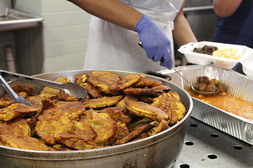 A close-up view of the plantains that were prepared in the kitchens of Notre Dame d'Haiti Mission for the meal delivery April 11, 2020. The meals were delivered to elderly residents who are precautionarily homebound in the neighborhoods surrounding the church during the COVID-19 pandemic. Volunteers prepared, cooked and delivered over 1000 meals.