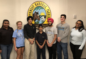 The Unity in Diversity 5K Production Committee Members pose for a photo at Southwest Ranches Town Hall. From left to right is Mesha Singh, of  NSU University School; Erika Castro, of Saint Thomas Aquinas High, Pavitpaul Makkar, from American Heritage, Japitpaul Makkar from Franklin Academy, Parneet Singh, of West Broward High, Nikolas Garcia, from Archbishop Edward A. McCarthy High, and Muskan Singh, from NSU University School.