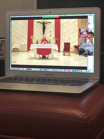This is how Dan Gonzalez, a parishioner at Our Lady of the Lakes in Miami Lakes, watched the Palm Sunday Mass April 5, 2020, alongside his mother and brother: "We created a Zoom meeting and invited my mom and my brother. Once they all logged in, I opened the Mass livestream in my browser then shared my screen with those in the Zoom meeting. This way we all could see and hear the Mass and each other at the same time. Worked great! You could probably do this with any number of people in the Zoom meeting."