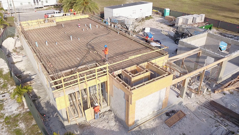 Workmen pour concrete to create the second floor of San Pablo Church's new rectory and office, April 21, 2020. The new construction is a result of the damages caused by Hurricane Irma in Marathon in 2017.