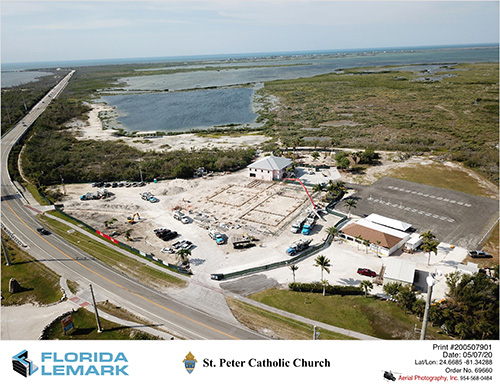 Aerial view of the grounds of St. Peter Church in Big Pine Key, taken May 7, 2020, when a concrete foundation was poured for the new church. The pink building in the middle is the ministry center which, before the pandemic, was being used for daily Masses and weekend Masses in the slow summer season. In winter, Masses were held in the enclosed outdoor pavilion at bottom right.