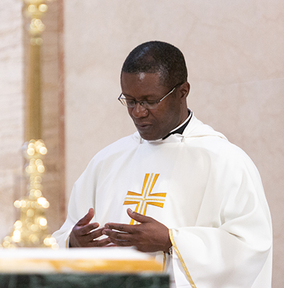 Father Jean Jadotte, chaplain at Archbishop McCarthy High School in Southwest Ranches, represented the school at the baccalaureate Mass for the entire archdiocesan class of 2020, which Archbishop Thomas Wenski celebrated May 19, 2020.