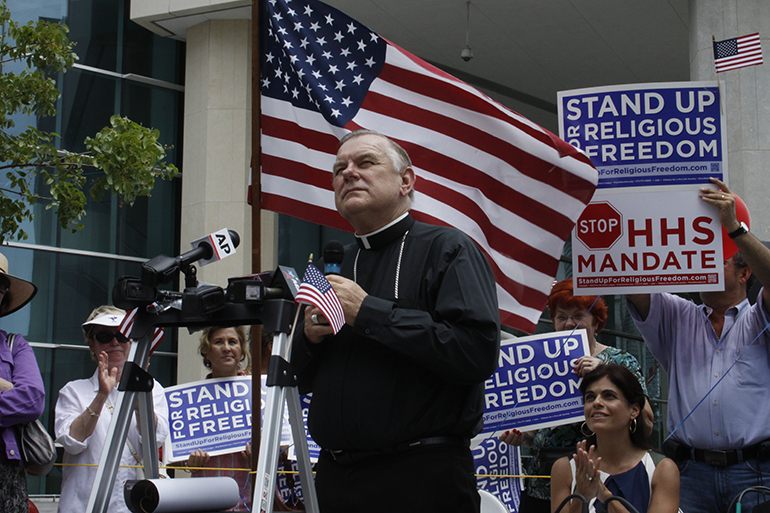 Archbishop Thomas Wenski addresses participants at a religious freedom rally in downtown Miami in this file photo from June 8, 2012. On June 22, 2020, he was named acting chair of the U.S. Bishops' Committee on Religious Liberty.