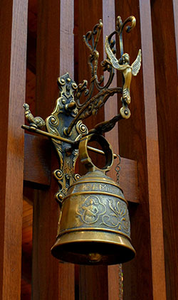 This ornate bell is rung as Mass begins at St. John the Baptist Church.