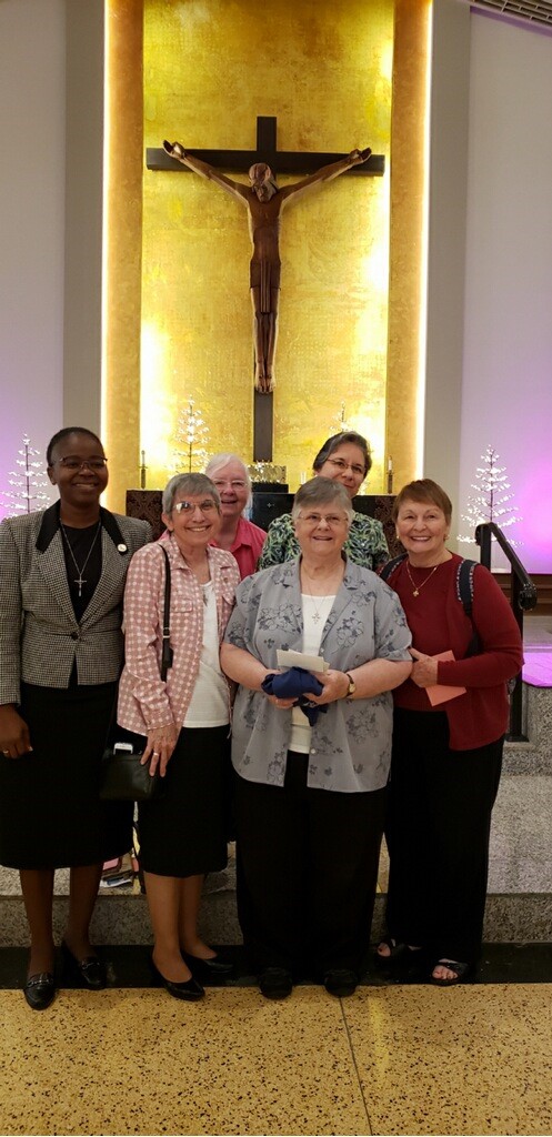 Franciscan Sisters of Allegany and some of their Miami Associates pose after the farewell Mass celebrated for them at Corpus Christi Church in Wynwood, where up to 90 sisters served over the years. Pictured in front, from left: Sister Lucy Cardet, Sister Michele Dolyk, and associate Marcia Gill. Back row, from left: associates Elysee Manshia, Pat Fairfield and Ella Pulido.