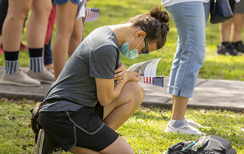 Naty Marie from Crossbridge Church in Miami Springs prays during the Unity Prayer Walk on June 27, 2020. The walk united people of faith from the area to peacefully pray for justice and reconciliation.