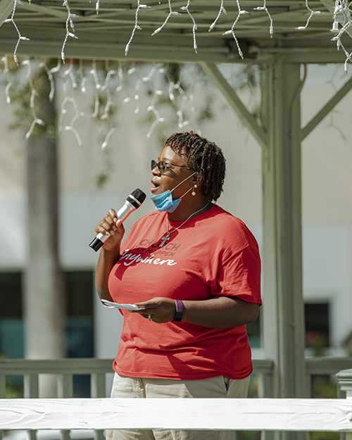 Rev. Ginger Medley, pastor of Poinciana United Methodist Church in Miami Springs, sings during the Unity Prayer Walk on June 27, 2020.