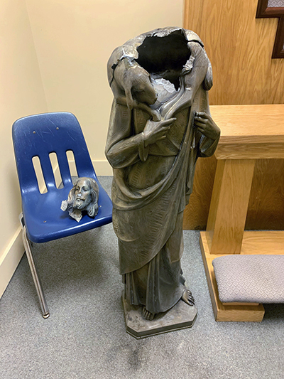 This statue of Christ as the Good Shepherd was decapitated sometime between the evening of July 14 and the morning of July 15, 2020, outside Good Shepherd Church in Kendall. Archbishop Thomas Wenski has asked that the incident be investigated as a hate crime.