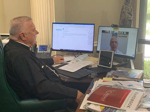 Archbishop Thomas Wenski listens via Zoom to Bishop Mario Moronta of Venezuela during the international conference put on by the Academy of Catholic Leaders of Latin America in which he participated July 20, 2020. The theme of the conference was "Challenges facing the Church after the worldwide pandemic: The view from Venezuela and the U.S."