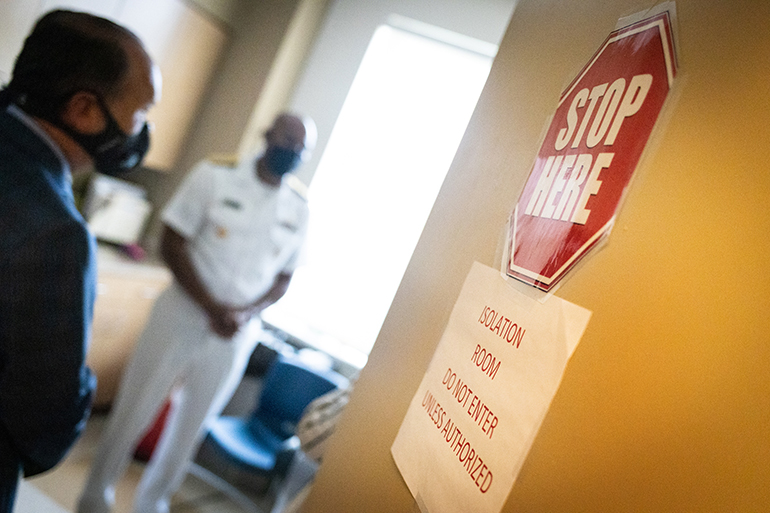 Dr. Jerome Adams, the 20th U.S. surgeon general, tours a clinical room at Camillus House shelter for the homeless in Miami, during a visit to South Florida on July 23, 2020. The surgeon general received a detailed tour of Camillus House and Camillus Health Concern and led a conversation with community leaders about the pandemic.