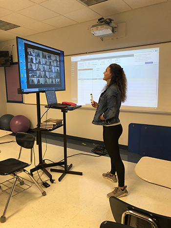 A Lourdes Academy teacher conducts virtual classes on the first day of school, Aug. 19, 2020. All the classrooms at the high school have been equipped with 50" Amazon Fire TVs, which are connected to new laptops -- all intended to facilitate the teaching and learning process during virtual classes.