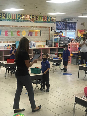 Photo of a socially distanced PreK3 classroom at Our Lady of Lourdes School, Miami, on the first day of school, Aug. 19, 2020.