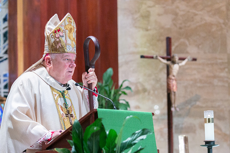 Archbishop Thomas Wenski preaches the homily while celebrating Mass on the 23rd anniversary of his ordination as bishop, Sept. 3, 2020. The Mass was celebrated with Pastoral Center staff at St. Martha Church, Miami Shores.