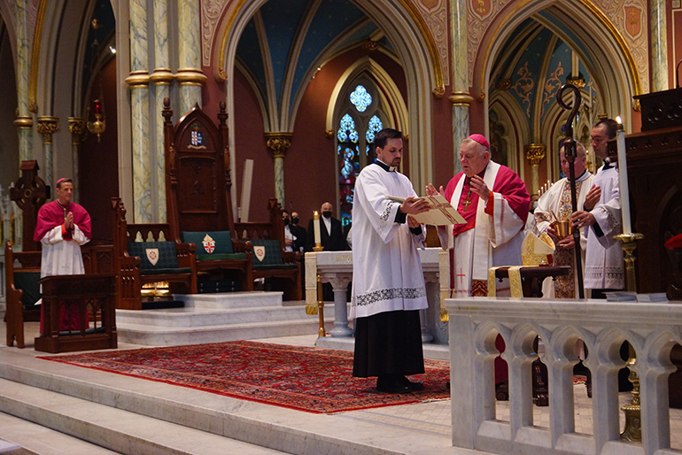 Archbishop Thomas Wenski blesses the new miter and crozier of Savannah's Bishop-elect Stephen Parkes (far left) during vespers Sept. 22, 2020 in the Cathedral of St. John the Baptist, Savannah.  During his tenure as bishop of Orlando, Archbishop Wenski had named Bishop Stephen Parkes, and his brother, St. Petersburg Bishop Gregory Parkes, as pastors of two newly established parishes.