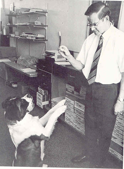 Marist Brother Eugene Trzecieski is shown here with his dog, Brandy, a St. Bernard that won the hearts of the students at Christopher Columbus High School and became the school’s mascot.