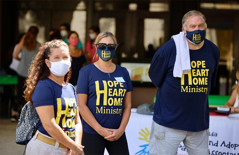 From left: Ada Avallone, Hope, Heart & Home's liaison at Our Lady of Lourdes Parish, Pam Cosio, of St. Louis Parish, and Eric Schwindeman, who founded the ministry at St. John Neumann Parish in 2018. Hope, Heart & Home is now active in all 11 parishes of the South Dade Deanery.