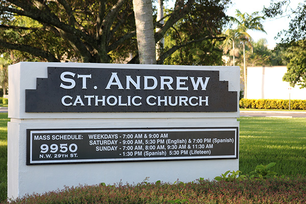 A sign on the grounds of St. Andrew Church near the street welcomes all. As it marks its 50th anniversary, Msgr. Michael Souckar, pastor, wants to make the parish "a spiritual home for all those who are looking for a place and for those who have gone lukewarm."