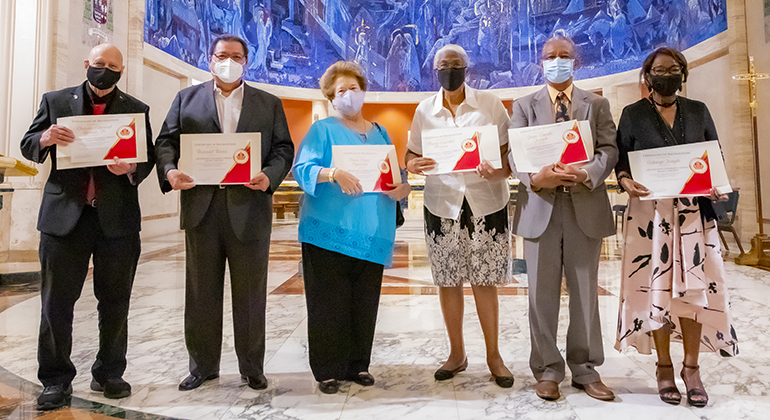 The 2020 inductees of the Archbishop Coleman Carroll Legacy Society who were able to attend the Thanks-for-Giving Mass celebrated at St. Mary Cathedral, Nov. 21, 2020. From left: Charles Edward Hutton Jr., Ronald Rivas, Maria Elena Figuerola, Marie Lourdes Montes, and Jean-Claude and Solange Joseph.