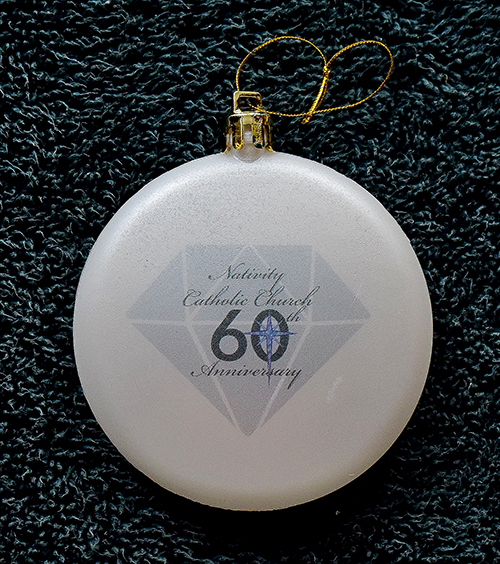 Those who attended the 60th anniversary Mass at Nativity Church were offered Christmas ornaments like this one.