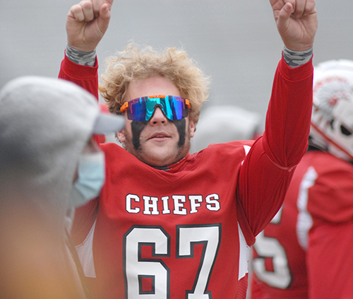 Cardinal Gibbons deep snapper Trey Dubuc starts to celebrate during Cardinal Gibbons' 35-21 victory over Jacksonville Bolles on Thursday, Dec. 17, 2020, in the Class 4A FHSAA State Football Championship Game at Bobby Bowden Field at Doak Campbell Stadium in Tallahassee.