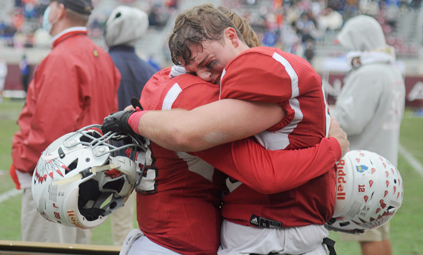 Cardinal Gibbons seniors Brody Palhegyi and William Spicer celebrate Cardinal Gibbons' 35-21 victory over Jacksonville Bolles on Thursday, Dec. 17, 2020, in the Class 4A FHSAA State Football Championship Game at Bobby Bowden Field at Doak Campbell Stadium in Tallahassee.