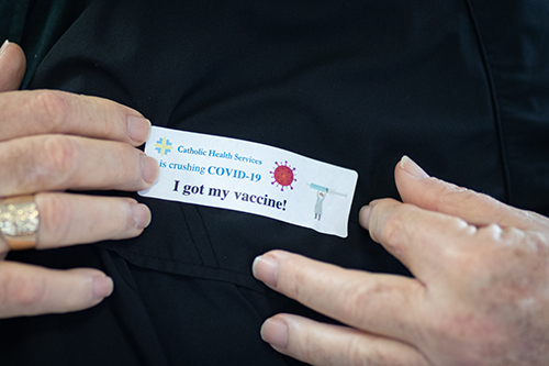 Archbishop Thomas Wenski was among the first to receive a COVID-19 vaccine when Florida state public health officials rolled it out Dec. 16, 2020 at St. John's Nursing Center in Fort Lauderdale, part of Catholic Health Services of the Archdiocese of Miami. Staff and residents of the facility were offered the Pfizer-BioNTech COVID-19 vaccine, which the U.S. Food and Drug Administration authorized for emergency use Dec. 11, 2020.