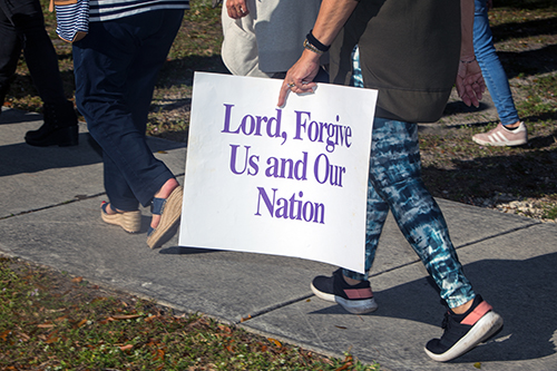 Blessed Trinity parishioners and others take part in a Prayer Walk For Life along Curtiss Parkway in Miami Springs, Jan. 23, 2021.
