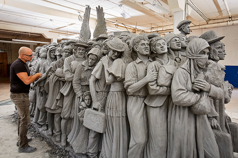 Sculptor Timothy Schmalz works on "Angels Unawares," which will be shown in Miami February 2021.