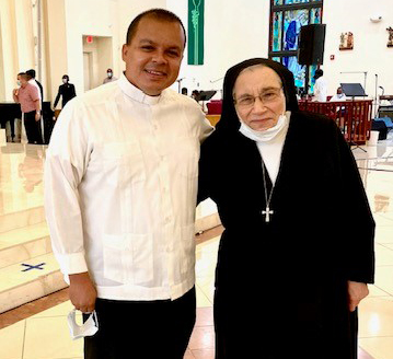 Salesian Sister Yamile Saieh is shown here with Father Elvis Gonzalez at her farewell Mass in September 2020. The two became good friends when he was director of the Office of Vocations and she served on the Vocations Board, screening would-be seminarians.