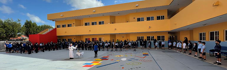 Students gather in the large courtyard at Mother of Our Redeemer School in northwest Miami-Dade County to receive their ashes in a socially distanced way, Feb. 17, 2021.