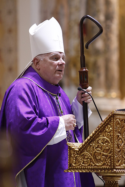 Archbishop Thomas Wenski preaches his homily while celebrating Ash Wednesday Mass at Miami's historic Gesu Church, Feb. 17, 2021.