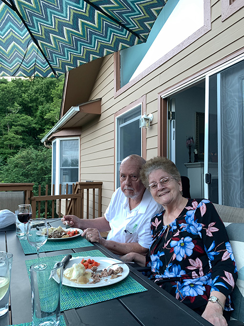 Deacon Michael Plummer having dinner with his wife, Roxann, in his North Carolina "hideout" from the coronavirus pandemic. That's where he came up with the idea of the "1,000 Rosaries for Life" campaign.