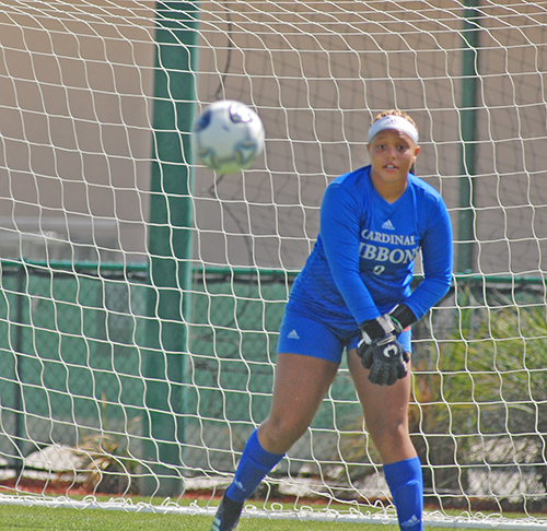 Junior goalkeeper Alexis Deveaux throws the ball to a teammate during the first half of Cardinal Gibbons' 2-0 victory over Panama City Beach Arnold in the FHSAA Class 4A girls soccer championship game March 3, 2021, at Spec Martin Stadium in DeLand. Deveaux made four saves, including a penalty, as the Chiefs won their first girls soccer championship.