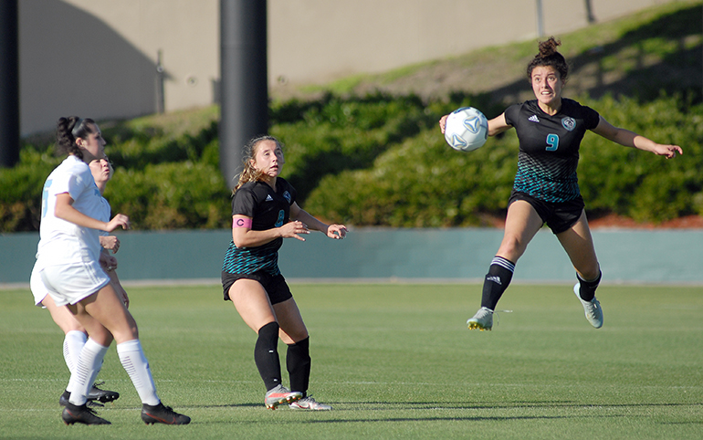 Archbishop McCarthy's Isabella Merchan goes for the ball in front of teammate Adriana Duque (8) and two Ponte Vedra players during the first half of Archbishop McCarthy's 2-0 loss to Ponte Vedra, March 5, 2021 in the FHSAA Class 5A Girls Soccer Championship Game at Spec Martin Stadium in DeLand.