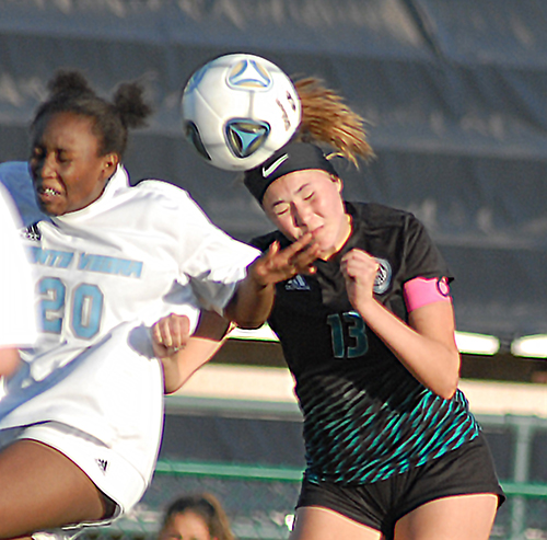 Archbishop McCarthy's Jessica Gonzalez, right, heads the ball away from Ponte Vedra's Kaylan Heinz during the first half of Archbishop McCarthy's 2-0 loss to Ponte Vedra, March 5, 2021 in the FHSAA Class 5A Girls Soccer Championship Game at Spec Martin Stadium in DeLand.