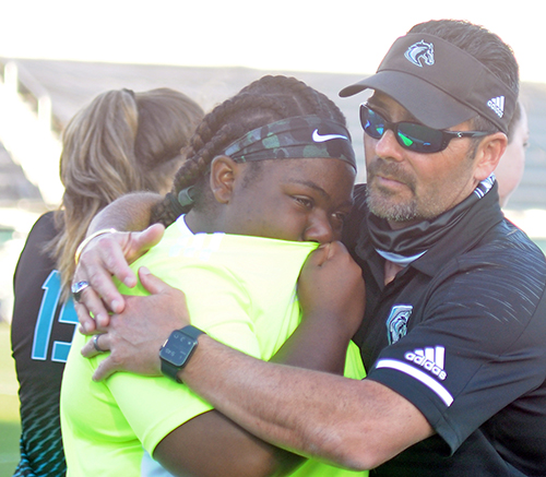 Coach Mike Sica consoles senior goalkeeper Jordyn Gifford after Archbishop McCarthy's 2-0 loss to Ponte Vedra, March 5, 2021  in the FHSAA Class 5A Girls Soccer Championship Game at Spec Martin Stadium in DeLand.