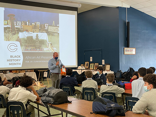 Christopher Columbus High Principal David Pugh addresses students at the beginning of the school's Black History Month event, Feb. 25, 2021.