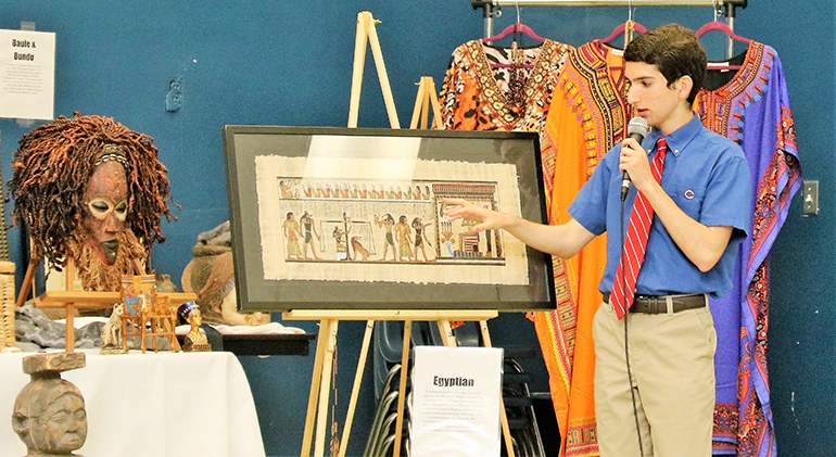 Senior Christopher de la Viesca explains Egyptian art during Christopher Columbus High School's Black History Month event, Feb. 25, 2021.