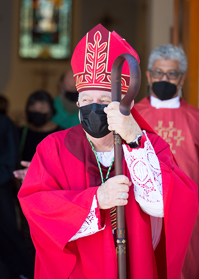 Archbishop Thomas Wenski exits the Basilica of St. Mary Star of the Sea in Key West after celebrating the annual Red Mass for legal professionals in the Florida Keys, March 5, 2021.