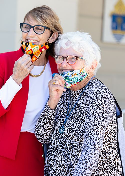 Key West Mayor Teri Johnston poses for a photo with local resident Jean Siohie following the annual Red Mass for Monroe County, celebrated March 5, 2021 at the Basilica of St. Mary Star of the Sea.