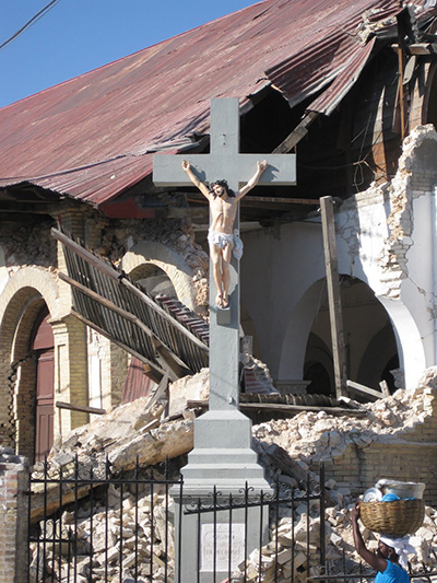 A crucifix was the only thing left unscathed in the ruins of Sacred Heart Church or Legliz Sacre Coeur in the Turgeau section of Port-au-Prince after the 2010 earthquake, from which Haiti has still not recovered completely. Hurricanes and COVID-19 have compounded the misery and suffering of the people.