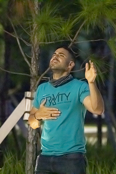 Gustavo Mejia, from St. Joseph Church in Miami Beach, participates in adoration during the EPIC Night of Mercy event celebrated at St. Thomas University in Miami Gardens, April 10, 2021.