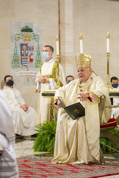 Archbishop Thomas Wenski preaches the homily while celebrating the transitional deacons ordination Mass at the Cathedral of St. Mary in Miami, April 11, 2021.