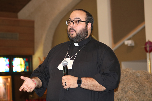 Father Matthew Gomez, vocations director for the Archdiocese of Miami, talks to members and guests of Serra Club of Broward County April 10, 2021 as they gathered for a Mass and talks on vocations at St. Gabriel Church in Pompano Beach.