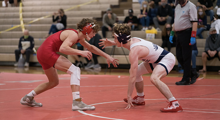 Cardinal Gibbons sophomore Nicholas Yancey, left, is seen here in action during his run to the state championship. Yancey guided the Chiefs to a fifth-place finish at the finals.